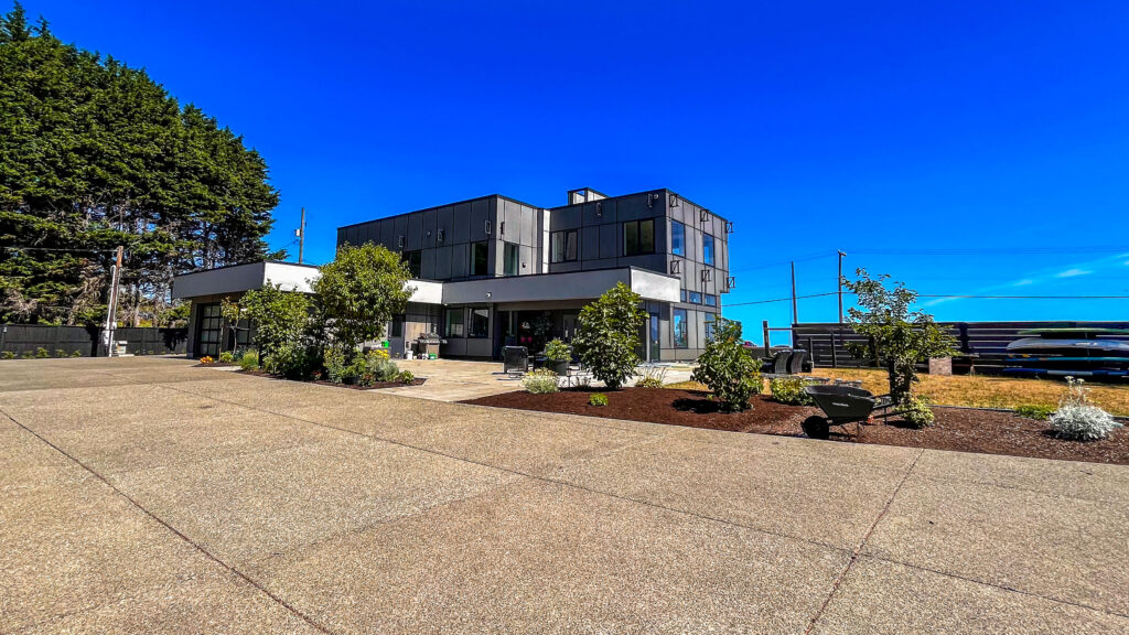 Front view of the house on a bright sunny day.