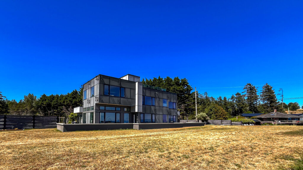 Roadside view of the house on a warm summer day.